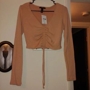 Burnt peaxh ruched long sleeve crop top